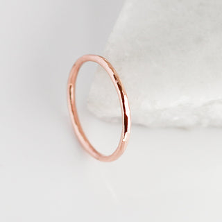 Hammered thin band in rose gold, side view