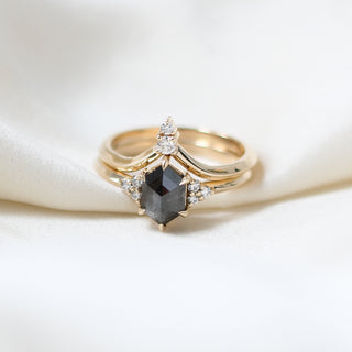 Custom pointed wedding band and engagement ring set with ethically sourced diamonds in a gold setting, handcrafted by Yuliya Chorna at her Toronto studio.