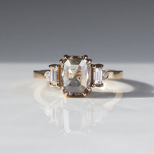 Emerald cut diamond ring in yellow gold front detail view