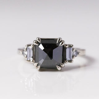 Custom square cut ring with ethically sourced centre stone in a silver setting, handcrafted by Yuliya Chorna at her Toronto studio.