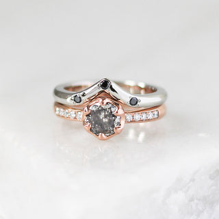 Custom pointed wedding band and engagement ring set with ethically sourced diamonds in a rose and white gold setting, handcrafted by Yuliya Chorna at her Toronto studio.