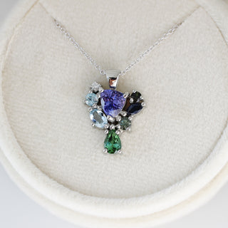 Custom mixed gemstone necklace with silver chain handcrafted by Yuliya Chorna at her Toronto studio.