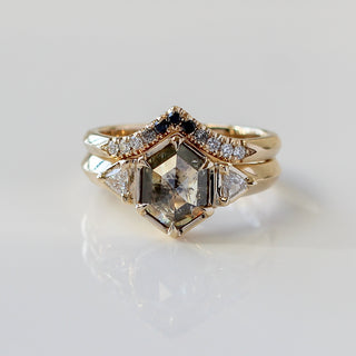 Custom point wedding band and engagement ring with ethically sourced salt and pepper diamonds in a gold setting, handcrafted by Yuliya Chorna at her Toronto studio.