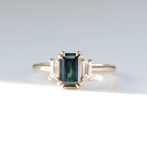 Emerald cut green sapphire engagement ring