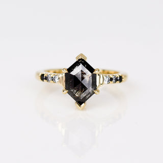 Custom ring with ethically sourced octagon centre stone in a gold setting, handcrafted by Yuliya Chorna at her Toronto studio.