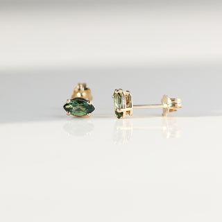 Marquise cut green sapphire earrings in solid gold side profile view