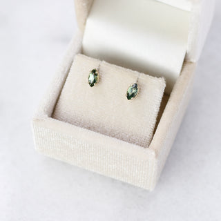 Marquise cut green sapphire earrings in jewellery box