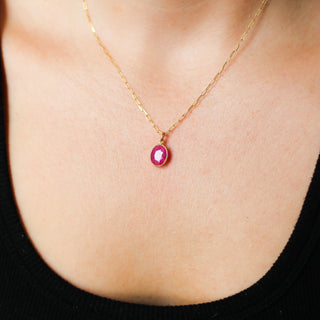 Large Ruby Bezel Charm being worn as a necklace
