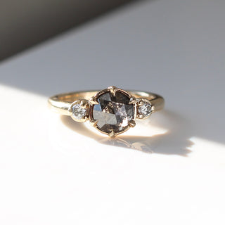 Round rose cut salt and pepper diamond ring in sunlight
