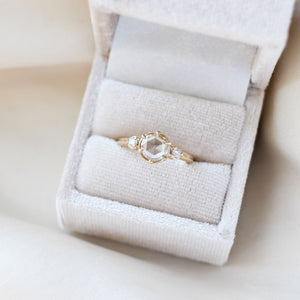 Round rose cut white diamond engagement ring in ring box