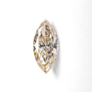 Marquise cut champagne diamond on white background 