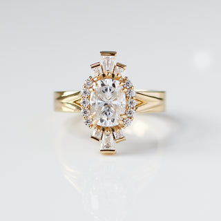 Custom Halo Ring with ethically sourced diamond centre stone in a gold setting, handcrafted by Yuliya Chorna at her Toronto studio.