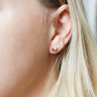Moon Stud Earrings beign worn