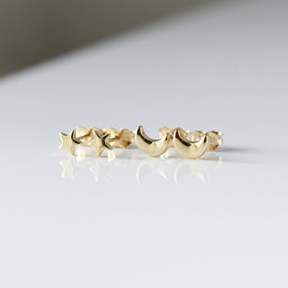 Moon Stud Earrings with star stud earrings quarter side view