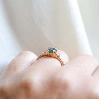 Cut Corner Rectangle Step Cut Green Sapphire Ring profile view on hand 