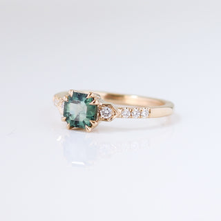 Cut Corner Rectangle Step Cut Green Sapphire Ring quarter side view