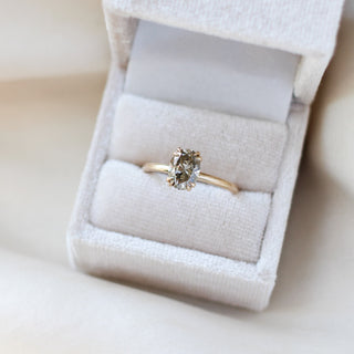 Oval cut champagne sapphire ring in yellow gold in ring box