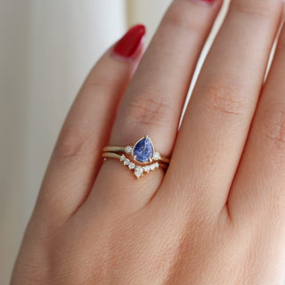 Pear Serina Diamond Band stacked with pear blue sapphire engagement ring, on hand