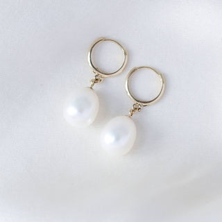 Pearl Drop Hoop Earrings front  side view on fabric