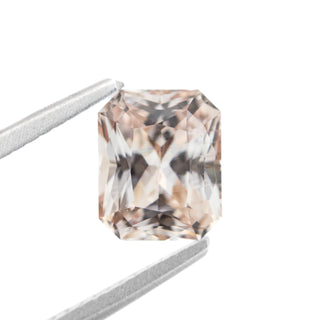 Radiant cut peach sapphire