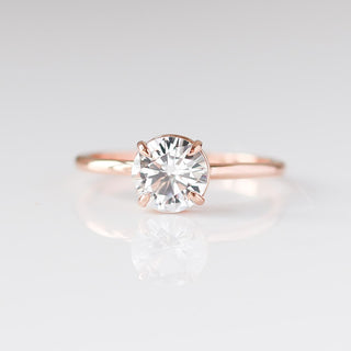 round white sapphire solitaire engagement ring front view
