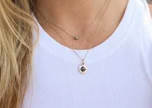 Round Rustic Diamond Pendant in group with a necklace on chain 