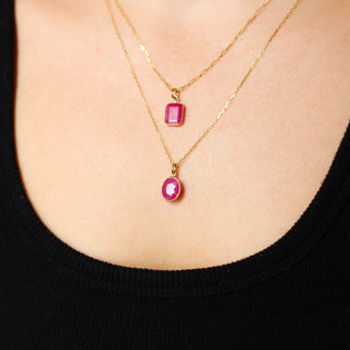Large Ruby Bezel Charms being worn as a necklaces front view