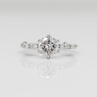 Custom engagement ring with ethically sourced solitaire diamond centre stone in a platinum setting, handcrafted by Yuliya Chorna at her Toronto studio.