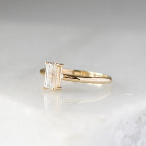 White sapphire ring side view