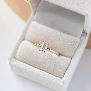 White sapphire ring in ring box