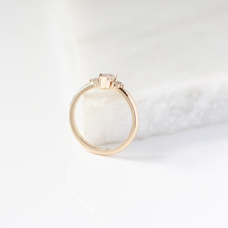 Champagne kite cut diamond ring with white diamond accents, side view