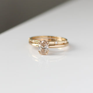 yellow gold diamond solitaire ring with yellow gold straight band