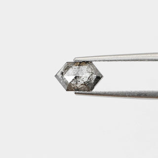 Hexagon shaped salt and pepper diamond in tongs