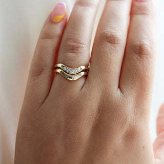Large Wave Gold Wedding Band stacked with Wave Diamond Band on hand 