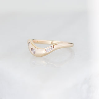 Yellow gold contour band with clear diamonds, quarter view