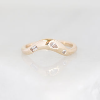 Yellow gold contour band with clear diamonds, front view