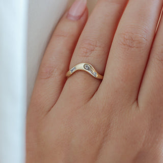 Yellow gold contour band with clear diamonds, on hand