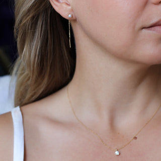 Pearl Threader Earrings in yellow gold being worn paired with 0.50ct Round Lab Diamond Necklace