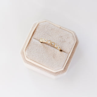 Yellow gold straight band with white diamonds, in ring box