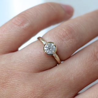 Round rose cut diamond ring in yellow gold on hand