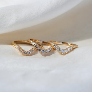 Set of three Sahara style wedding bands, front view on fabric