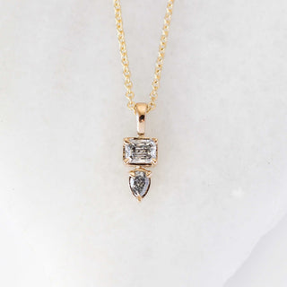 Emerald and pear cut diamond necklace front view