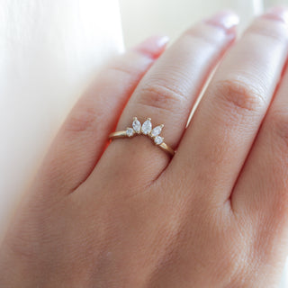 Yellow gold crown contour band with white diamonds, on hand