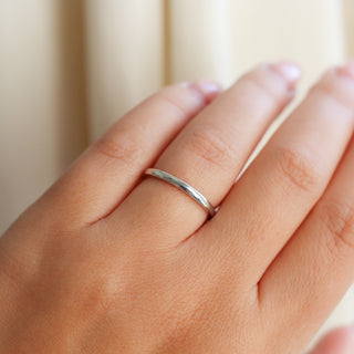 White gold 2mm band on hand