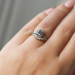 1.18ct Emerald Cut Salt & Pepper Diamond Ring stacked with curved white gold diamond band, on hand