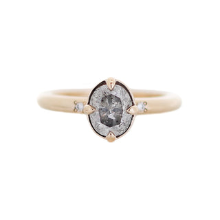 Oval cut diamond in yellow gold front detail view