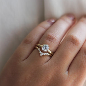 Pear Sahara Diamond Ring stacked with round diamond ring  on hand