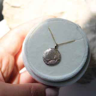 beach textured diamond necklace in jewelry box