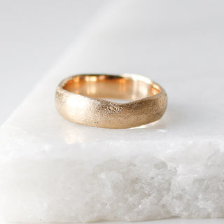 Beach Textured Wide Band on marble quarter view