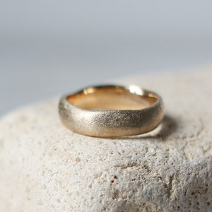 Textured Wide Band in Yellow Gold profile view on stone